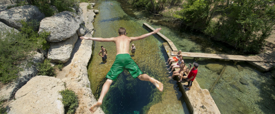 Karst springs make iconic swimming holes (Jacobs Well).